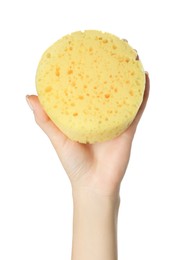 Woman holding new yellow sponge on white background, closeup