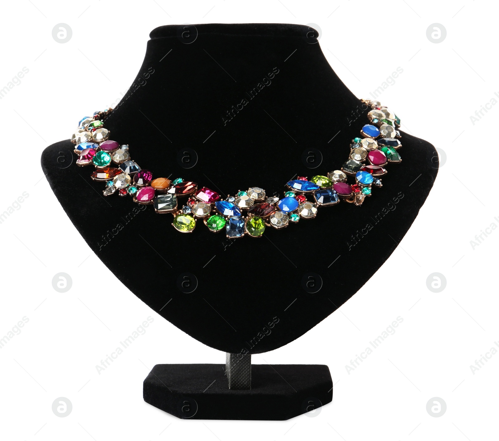 Photo of Stylish necklace with gemstones on jewelry bust against white background