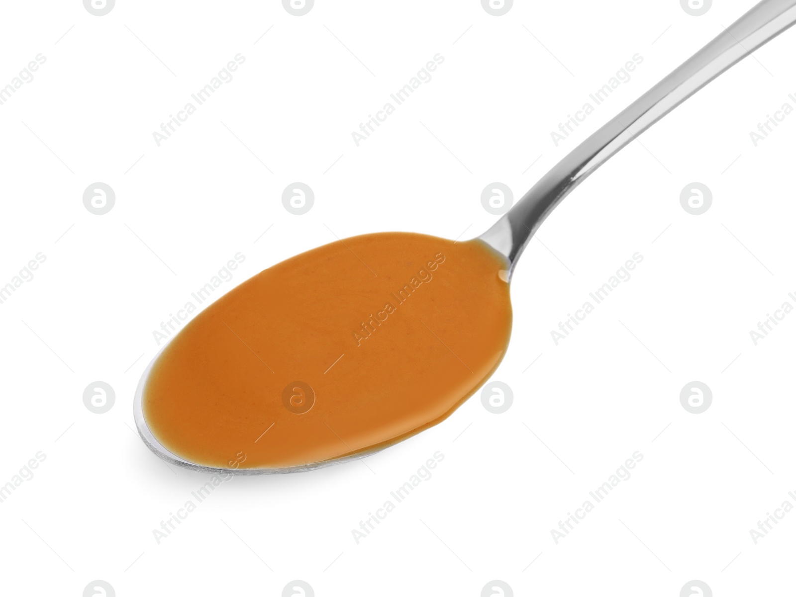 Photo of Spoon with tasty peanut butter isolated on white