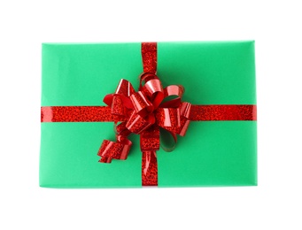 Photo of Christmas gift box decorated with ribbon bow on white background, top view