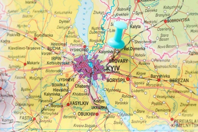 Photo of MYKOLAIV, UKRAINE - NOVEMBER 09, 2020: Brovary city near Kyiv marked with push pin on map of Ukraine, closeup