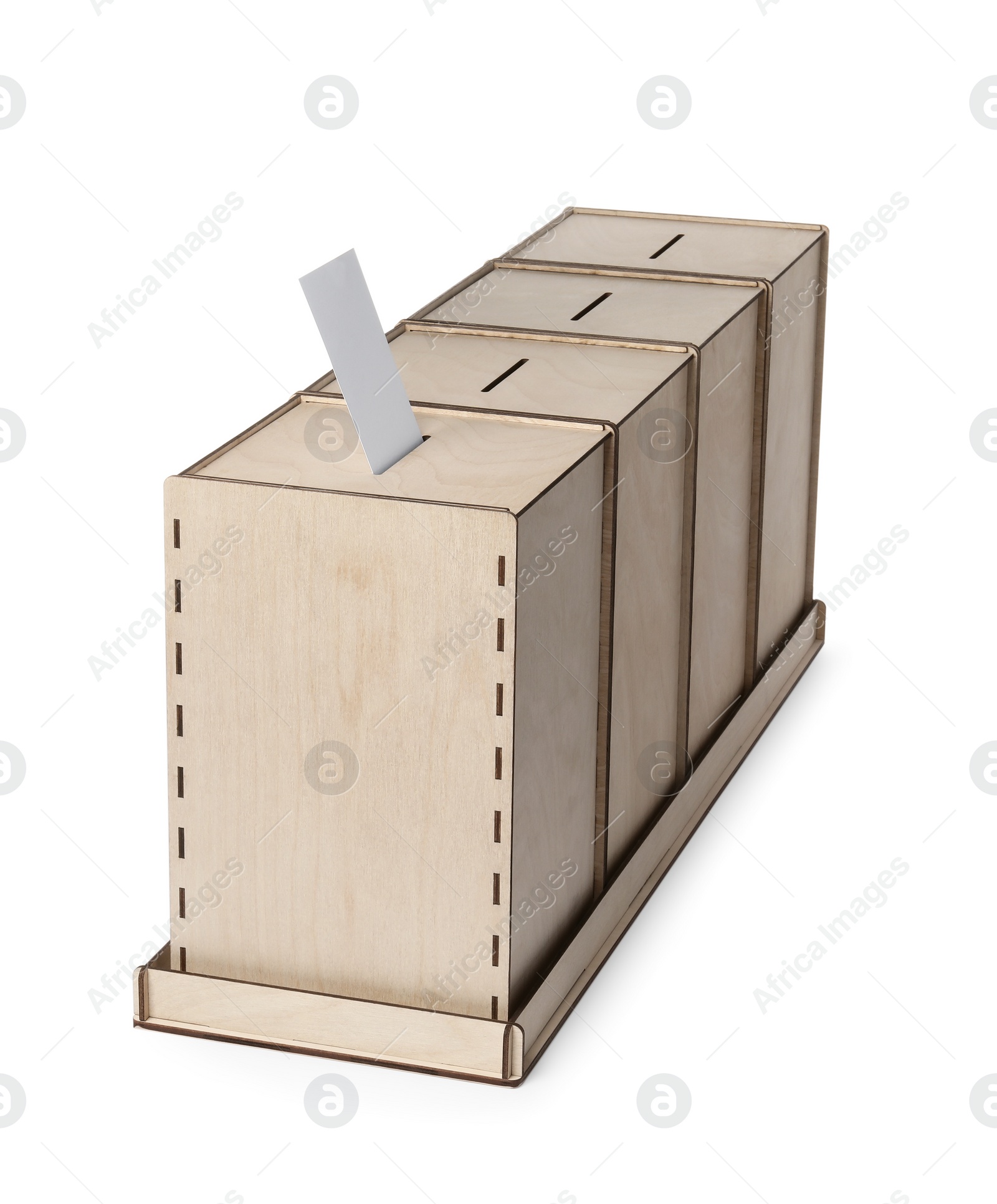 Photo of Wooden ballot boxes with vote isolated on white