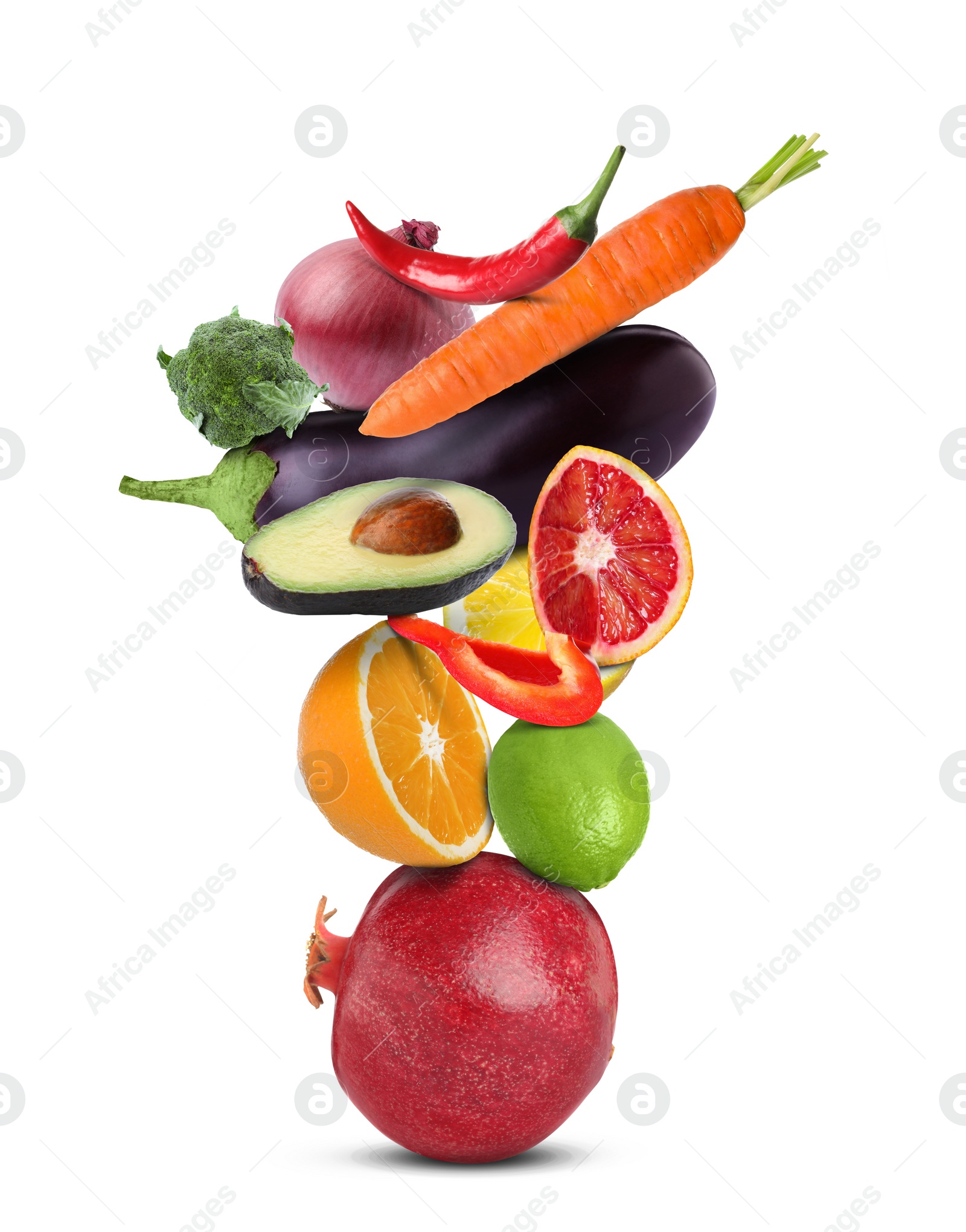 Image of Stack of different vegetables and fruits isolated on white