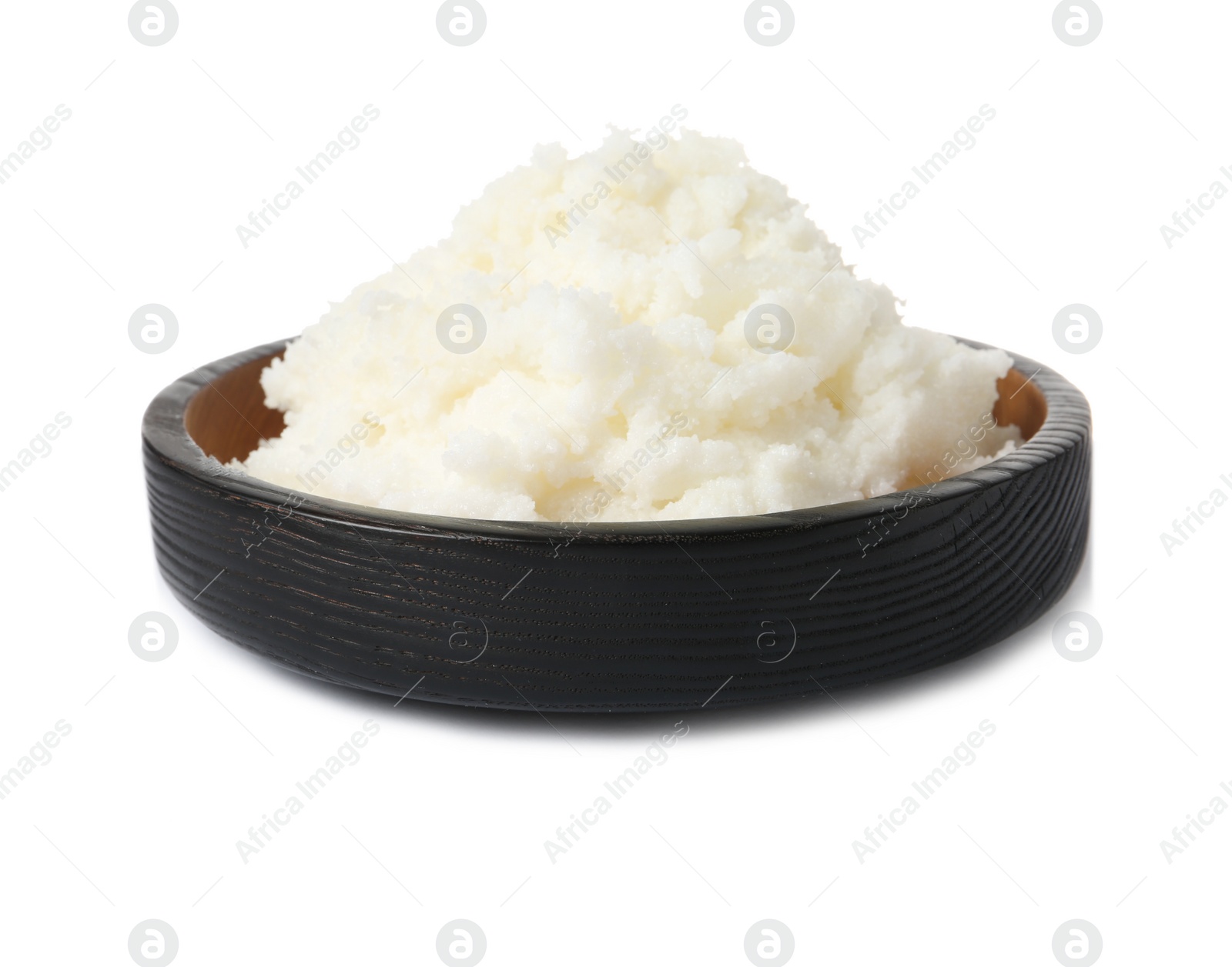 Photo of Shea butter in bowl isolated on white