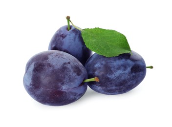Delicious fresh ripe plums on white background