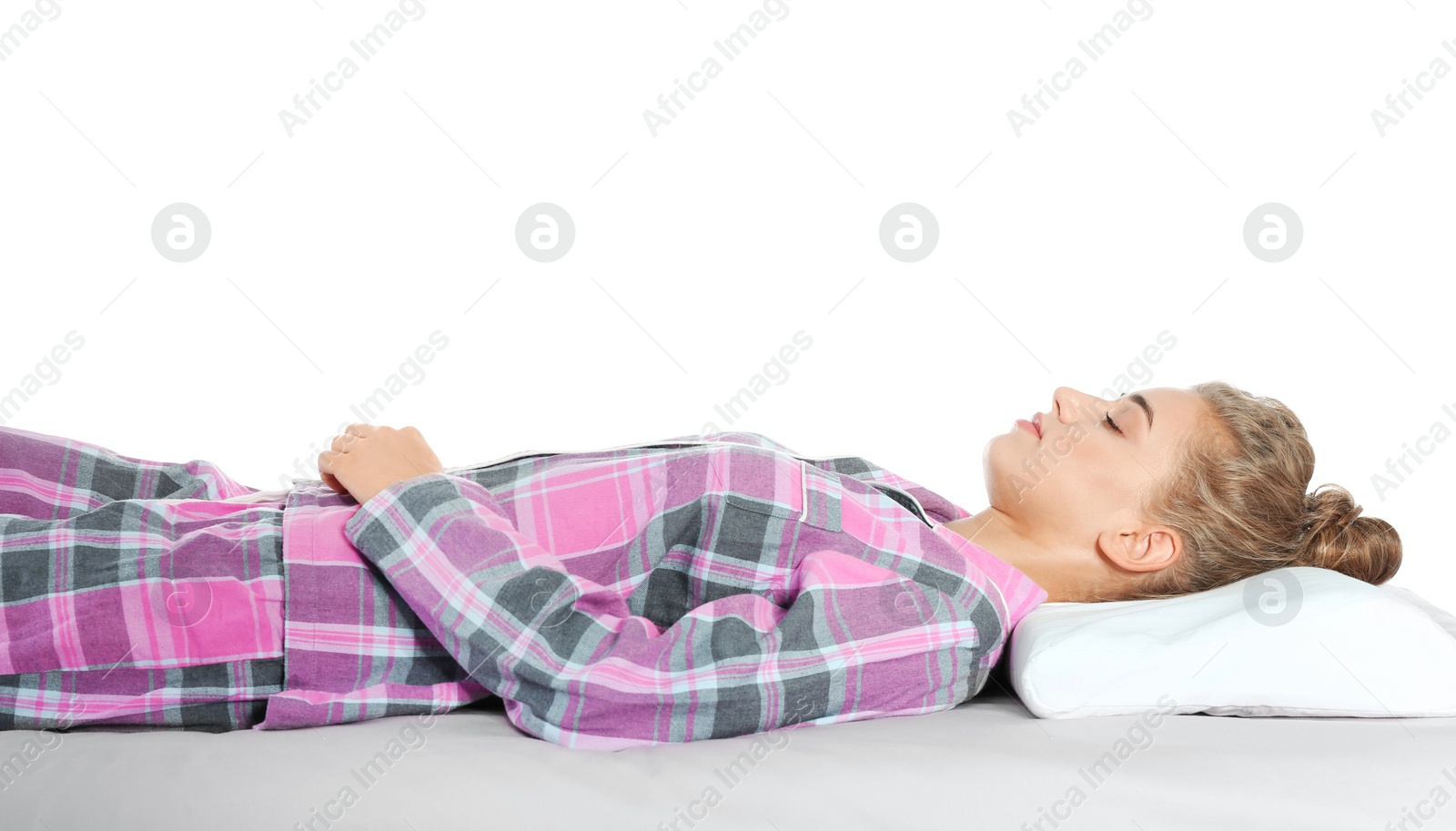 Photo of Beautiful woman sleeping with orthopedic pillow on bed against white background