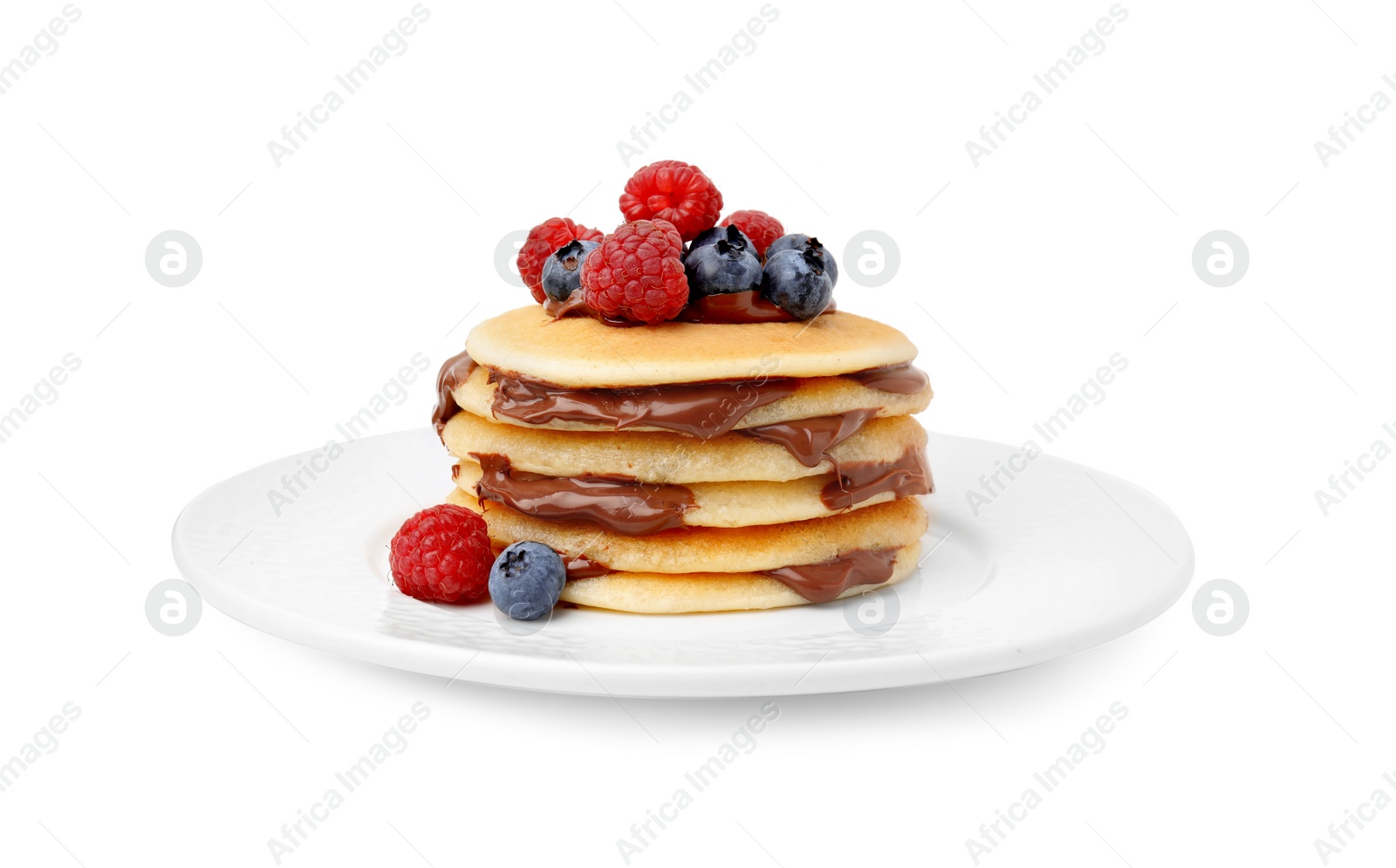 Photo of Stack of tasty pancakes with chocolate spread and berries isolated on white