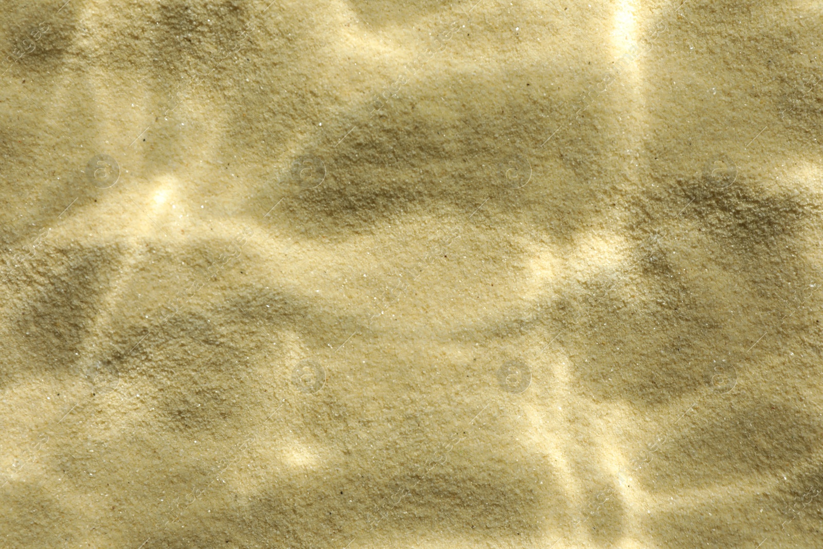 Photo of Sand under water as background, top view