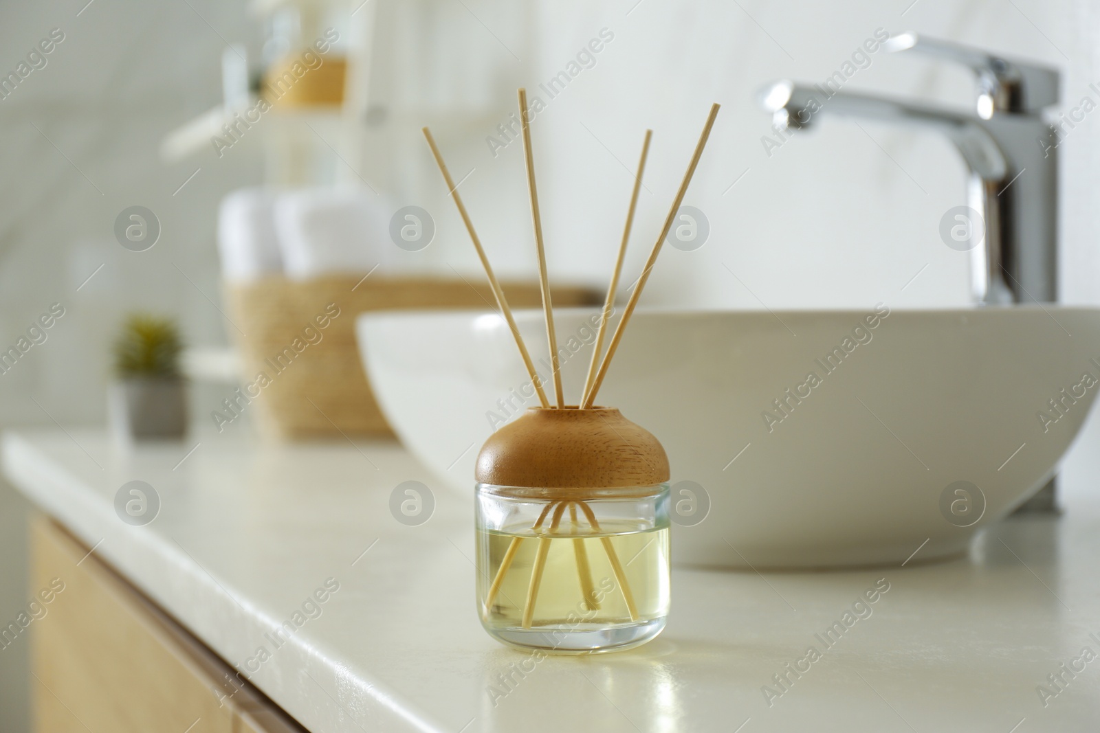 Photo of Reed air freshener on counter in bathroom