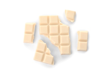 Photo of Delicious chocolate pieces on white background, top view