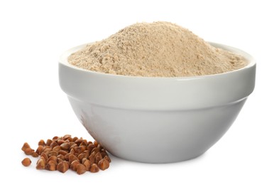 Bowl of buckwheat flour on white background