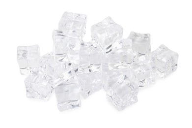 Photo of Many crystal clear ice cubes isolated on white