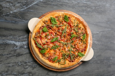 Tasty homemade pizza on table, top view