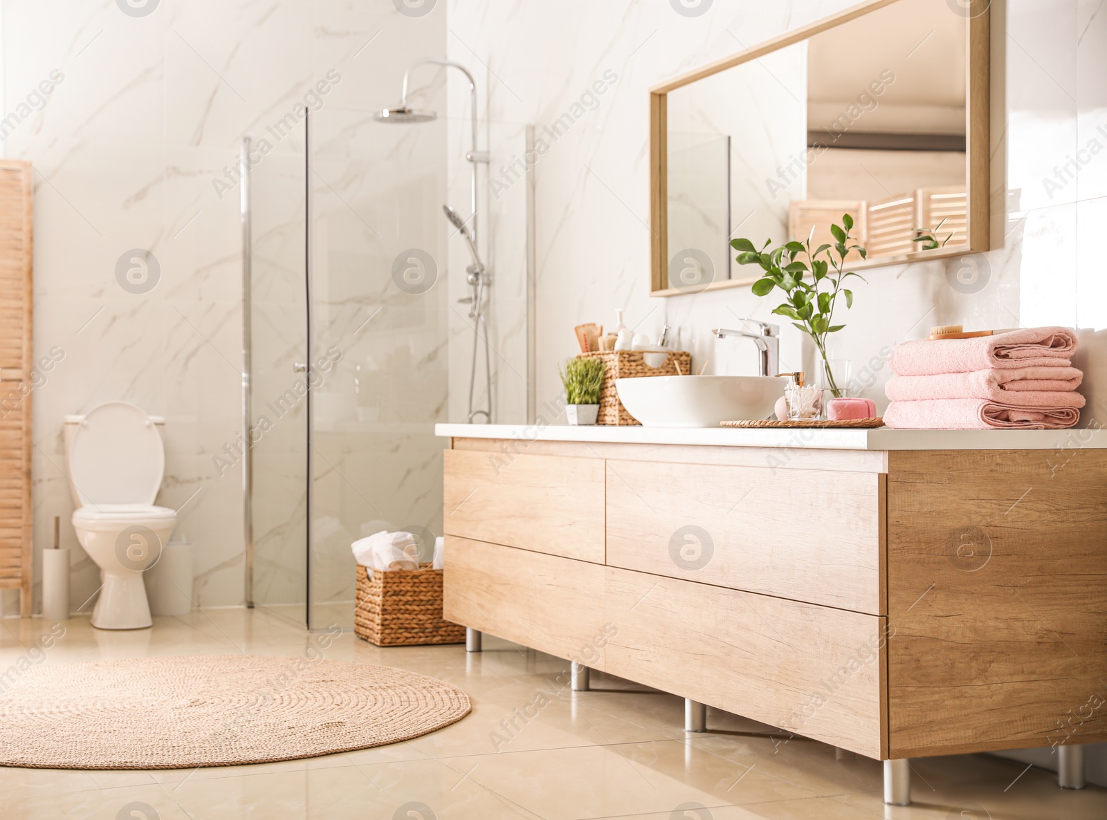 Photo of Interior of stylish bathroom with shower unit