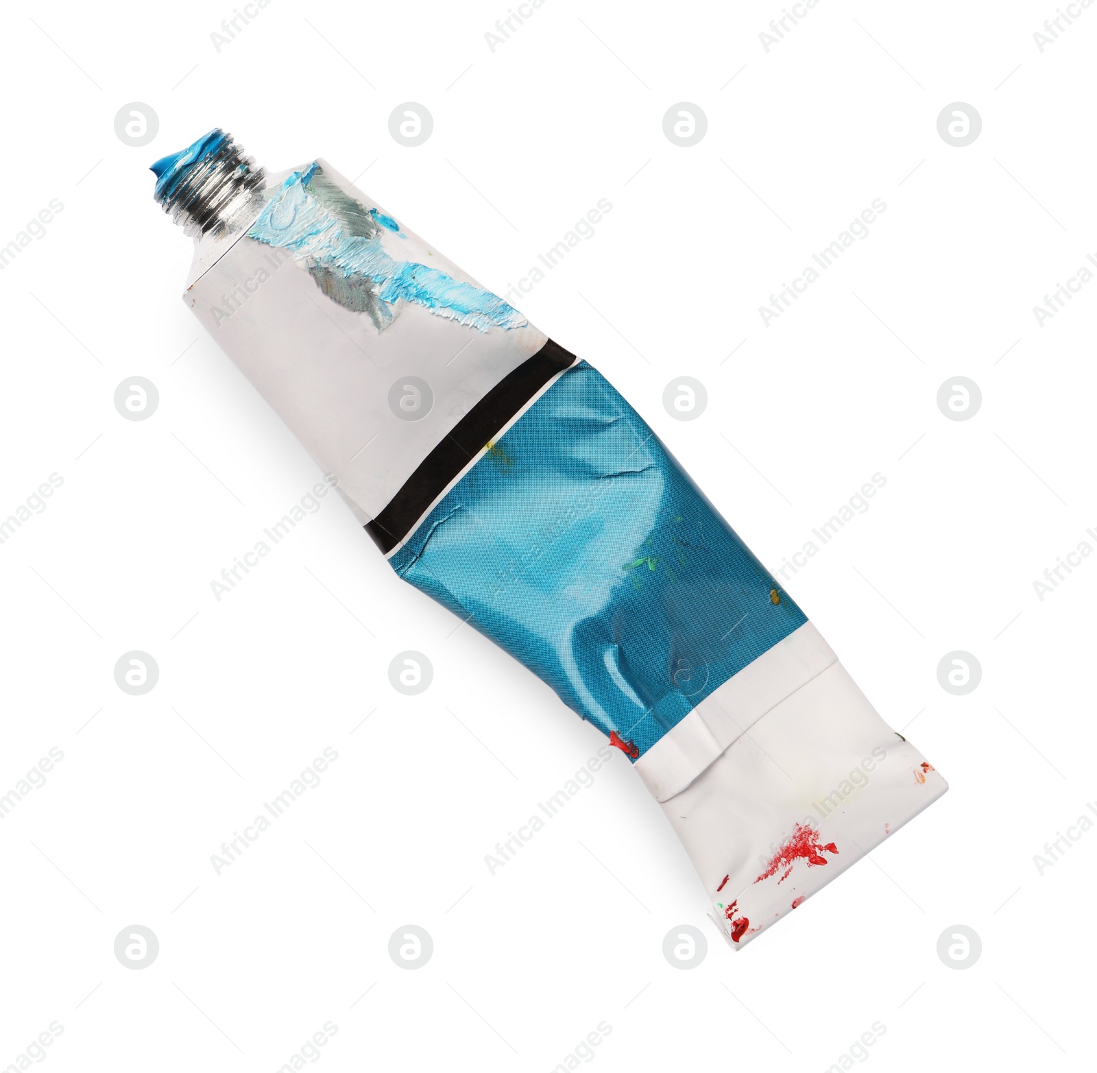 Photo of Tube with oil paint on white background, top view