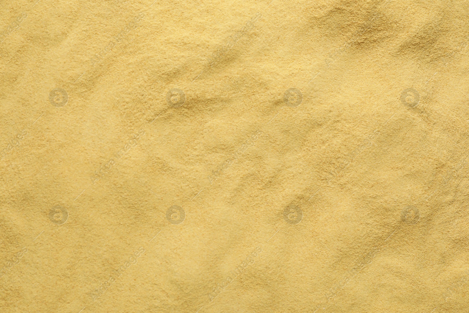 Photo of Granulated brewer`s yeast as background, top view