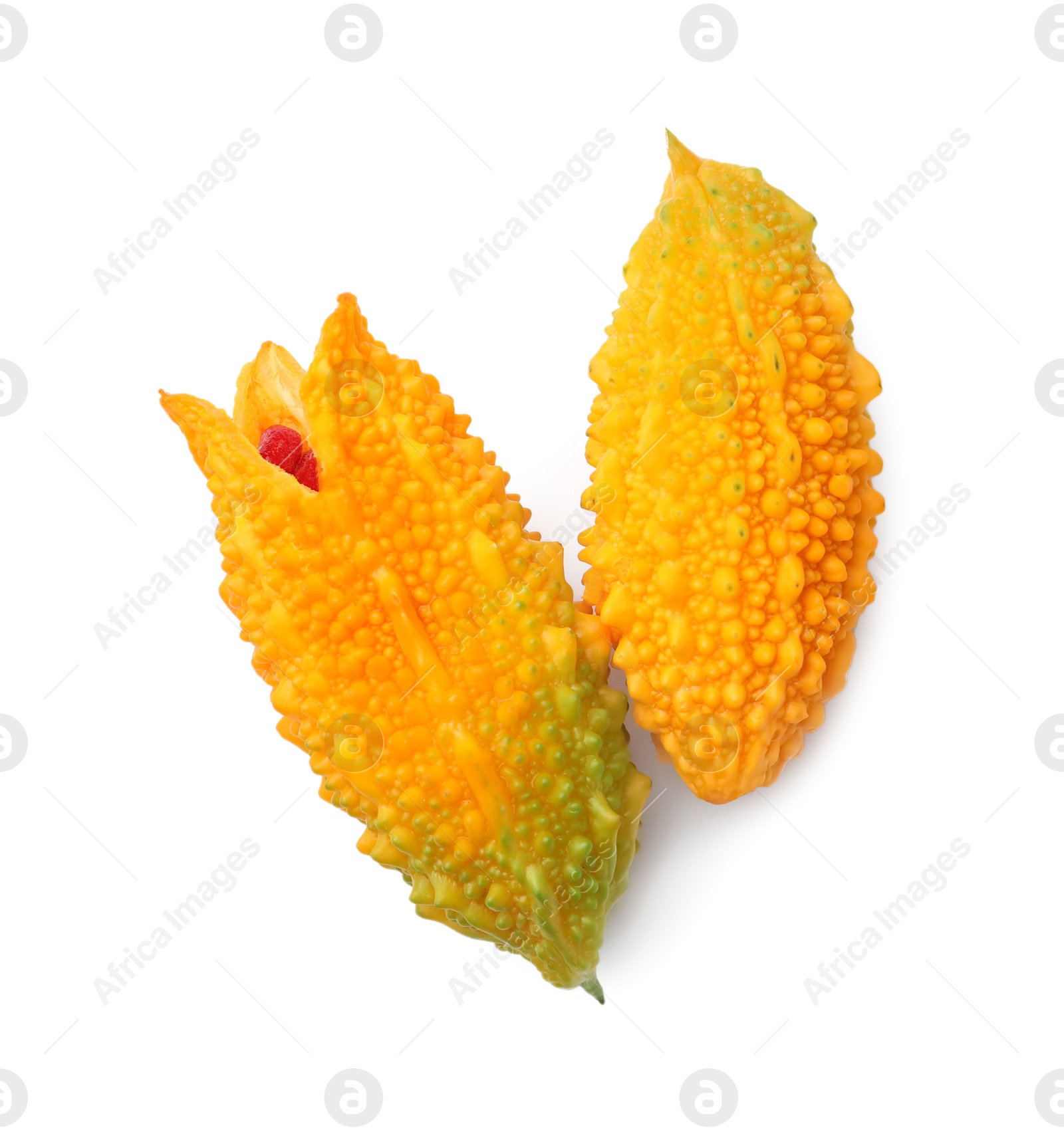 Photo of Fresh ripe bitter melons on white background, top view