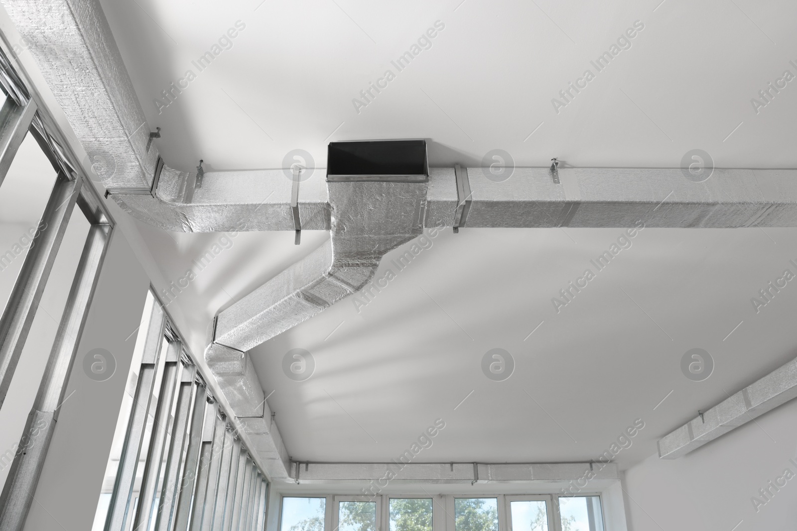 Photo of Ceiling with ventilation system indoors, bottom view