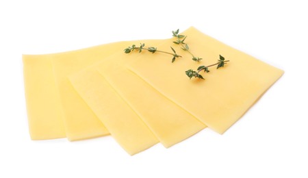 Photo of Slices of tasty fresh cheese and thyme isolated on white