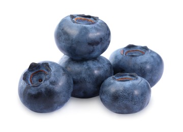 Photo of Many fresh ripe blueberries isolated on white