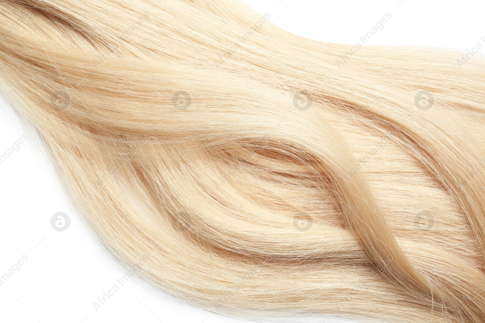 Photo of Locks of healthy blond hair on white background