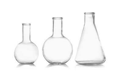 Group of empty chemistry glassware isolated on white