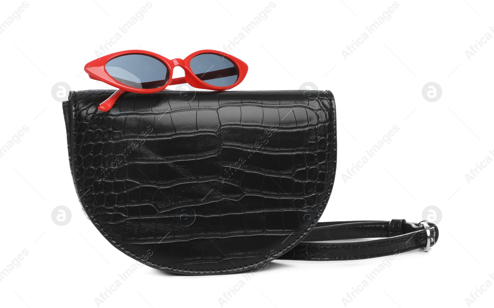 Photo of Stylish woman's bag and sunglasses isolated on white