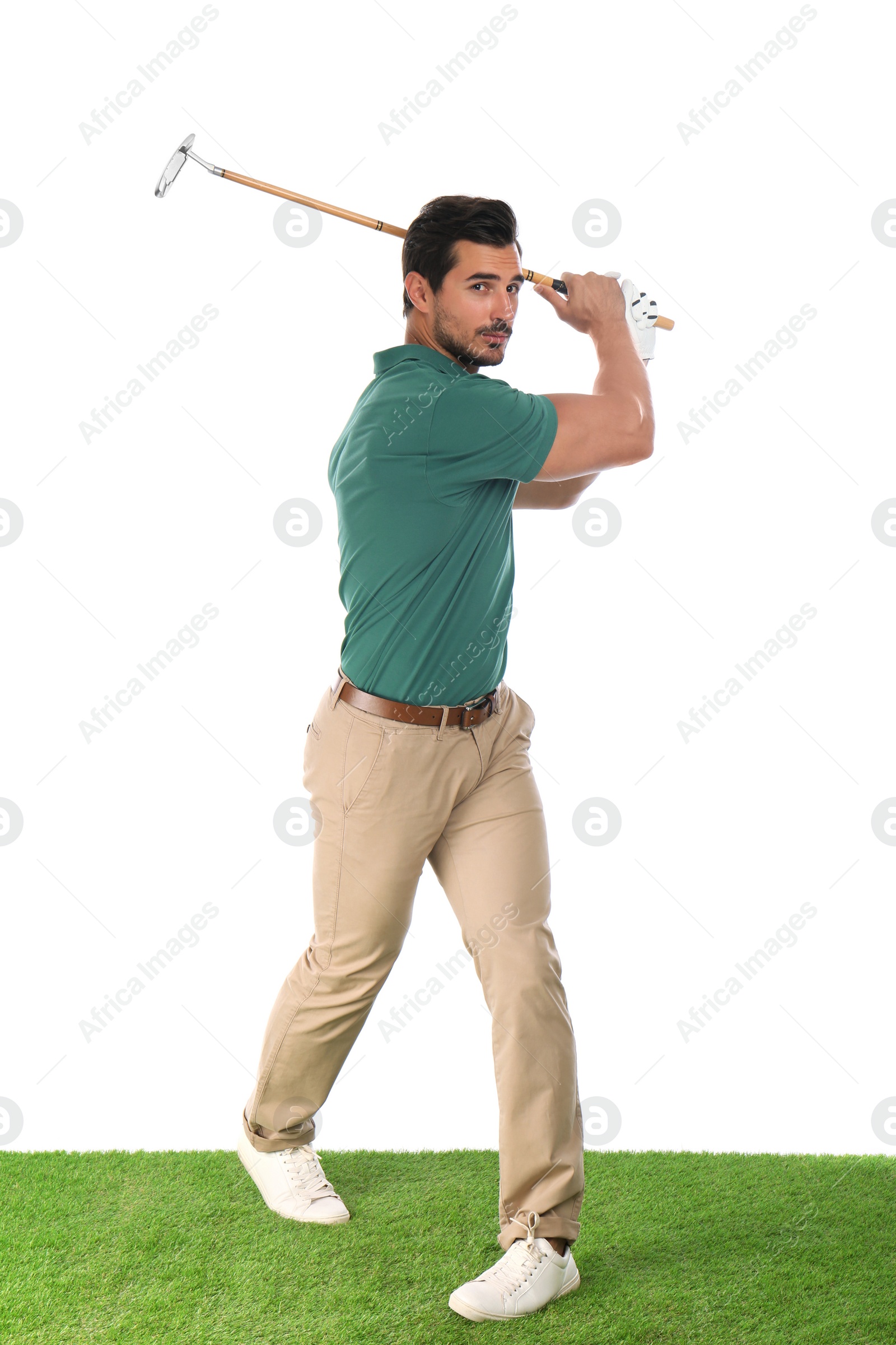 Photo of Young man playing golf on white background