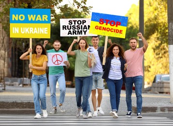 Image of Stop war in Ukraine. Protesting people with placards outdoors