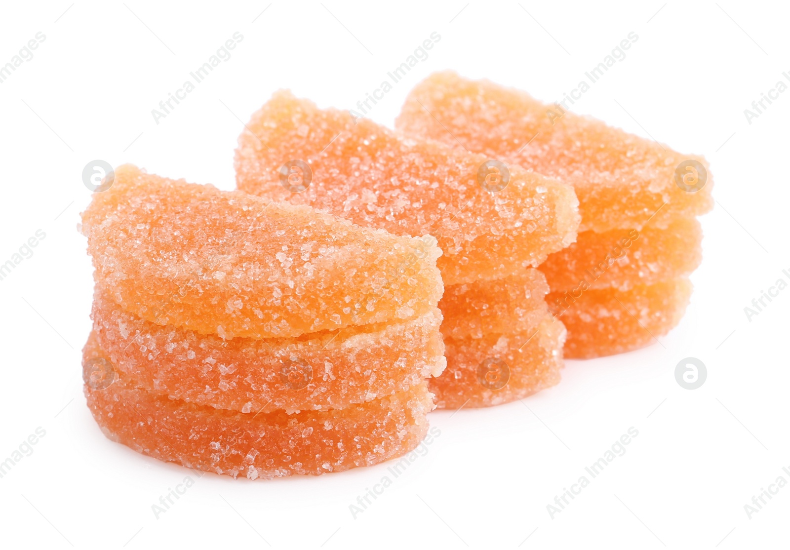 Photo of Sweet orange jelly candies on white background