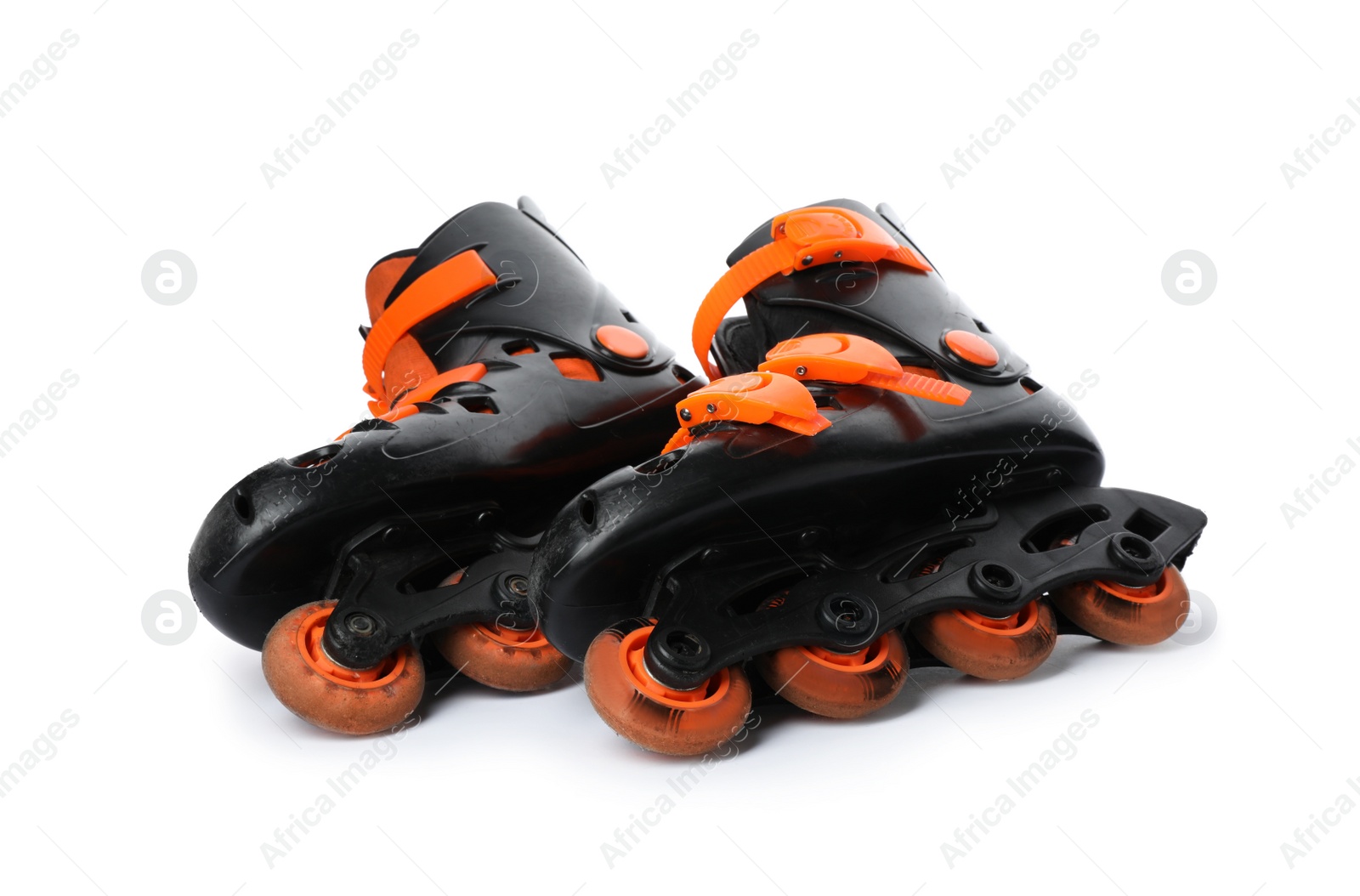 Photo of Pair of inline roller skates on white background