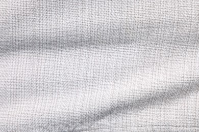 Texture of white fabric as background, top view