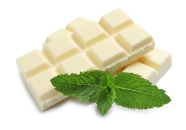 Pieces of white chocolate with mint on white background