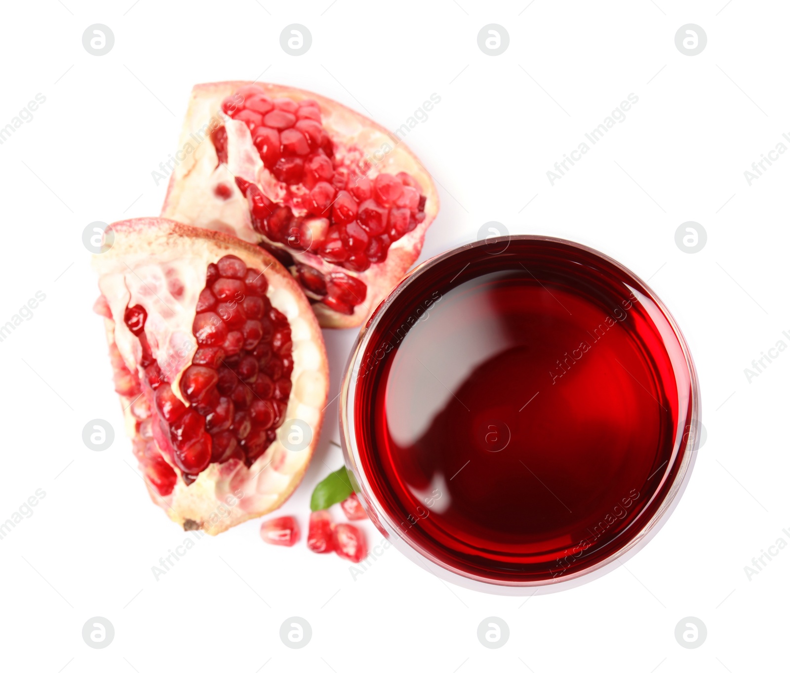 Photo of Freshly made pomegranate juice on white background, top view