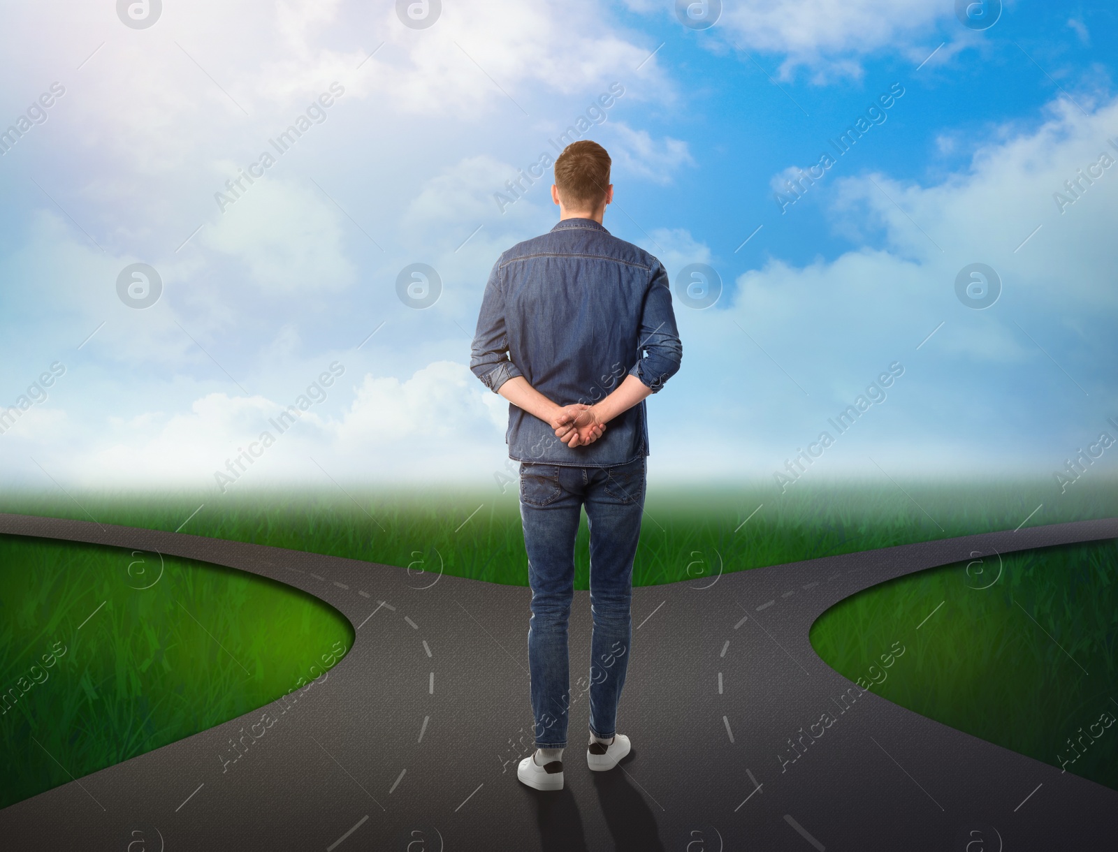 Image of Choose your way. Man standing at crossroads taking important decision