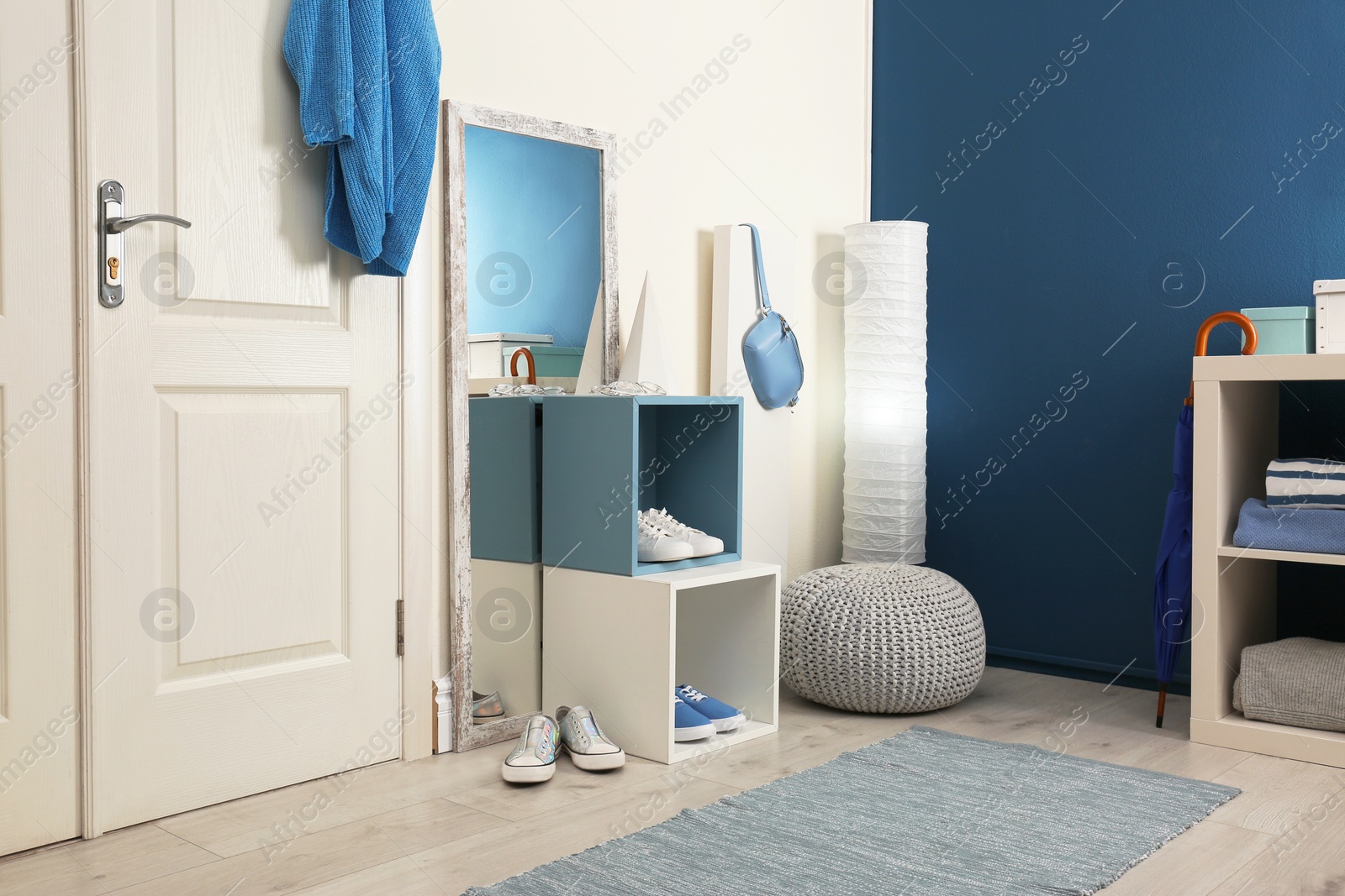 Photo of Cozy hallway interior with new stylish furniture