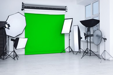 Chroma key compositing. Green backdrop and equipment in studio
