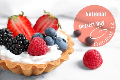 Image of National Dessert Day, October 14. Tasty tartlet with different fresh berries on white marble table, closeup