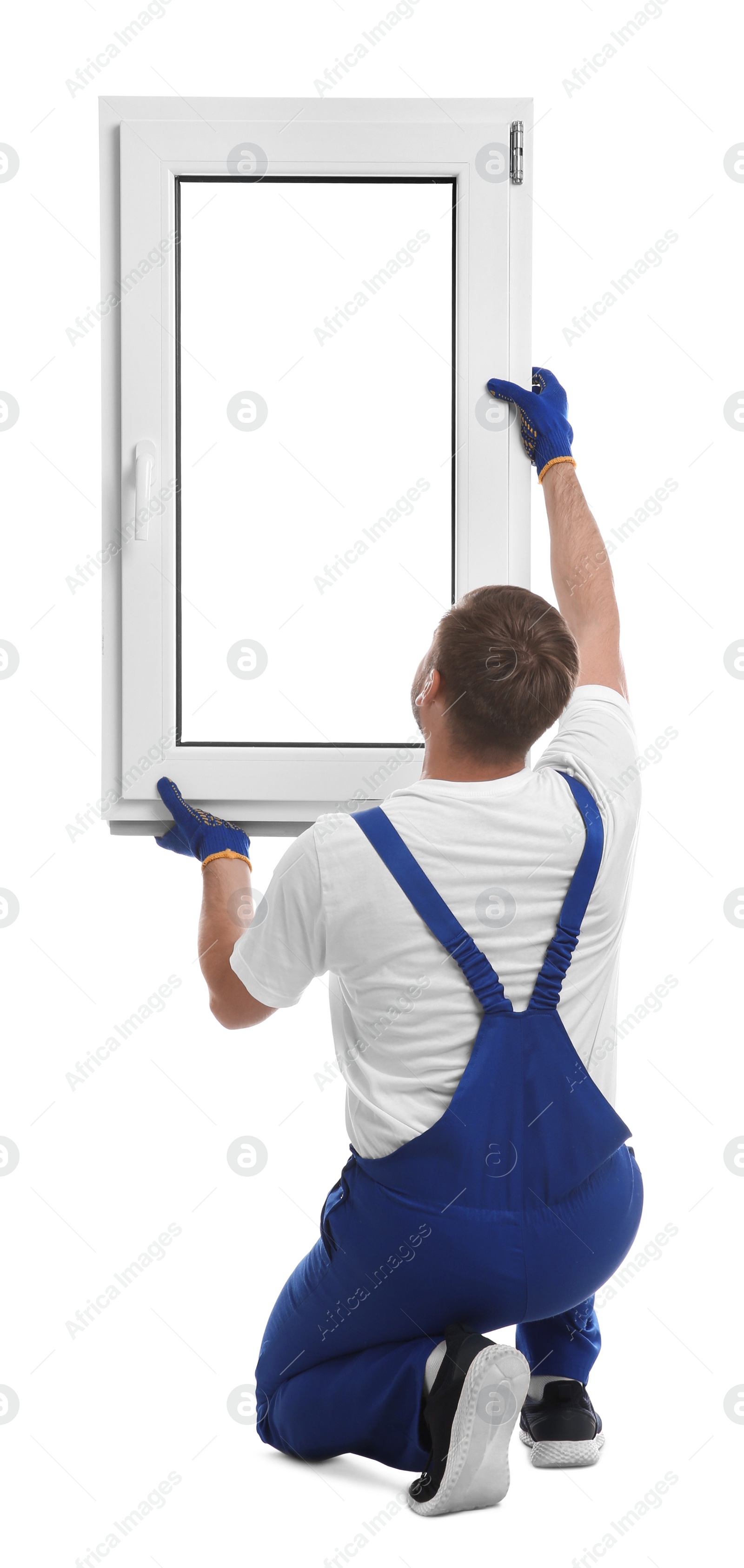 Photo of Worker with plastic window on white background, back view. Installation service