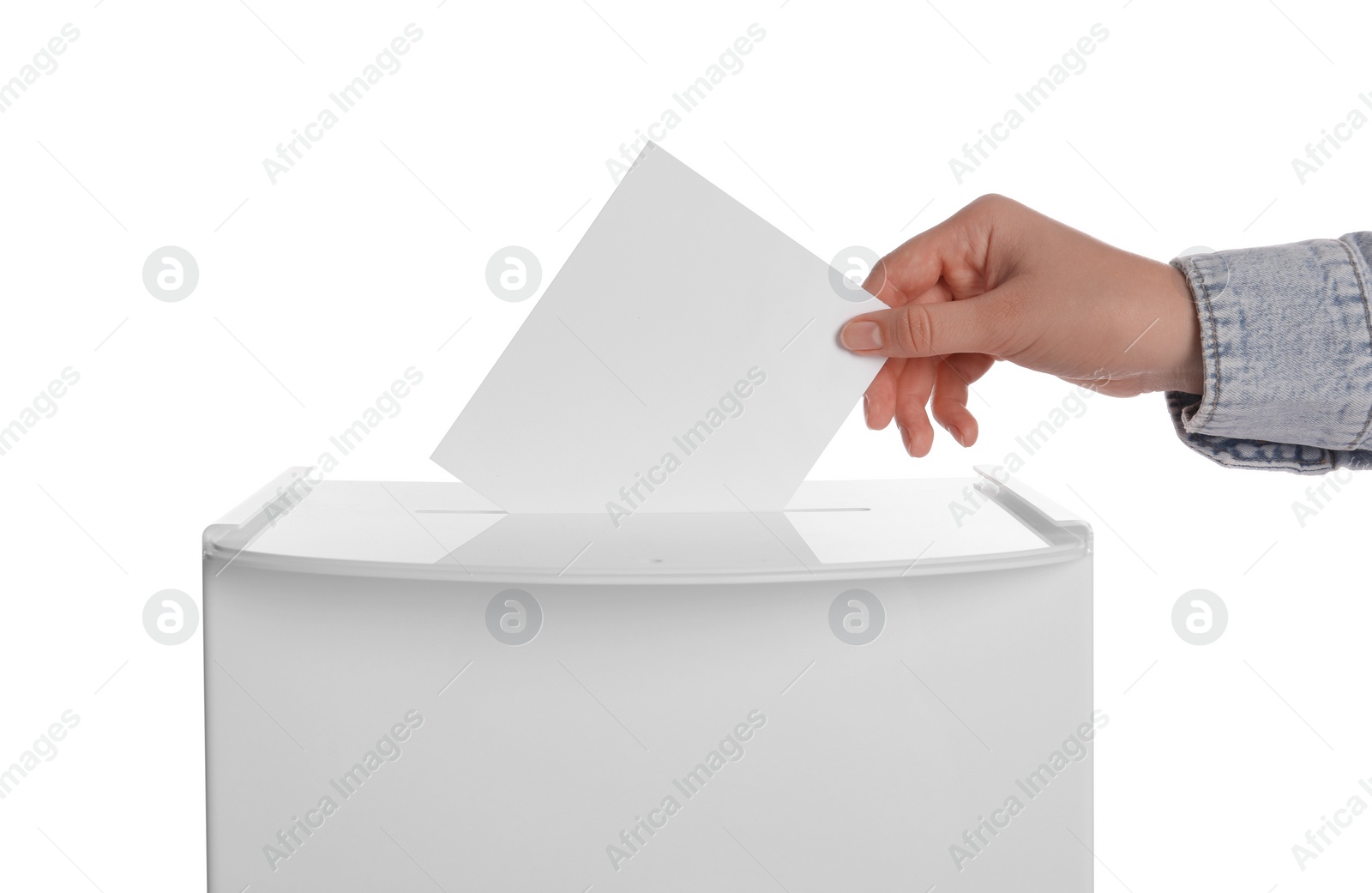 Photo of Woman putting her vote into ballot box on white background, closeup