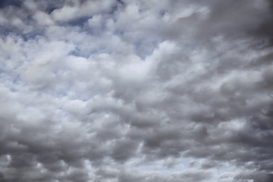 Image of Sky covered with rainy clouds. Stormy weather