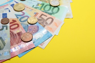 Image of Money on yellow background, closeup. Space for text 