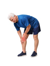 Full length portrait of senior man having knee problems on grey background