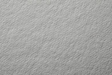 Texture of white paper sheet as background, closeup