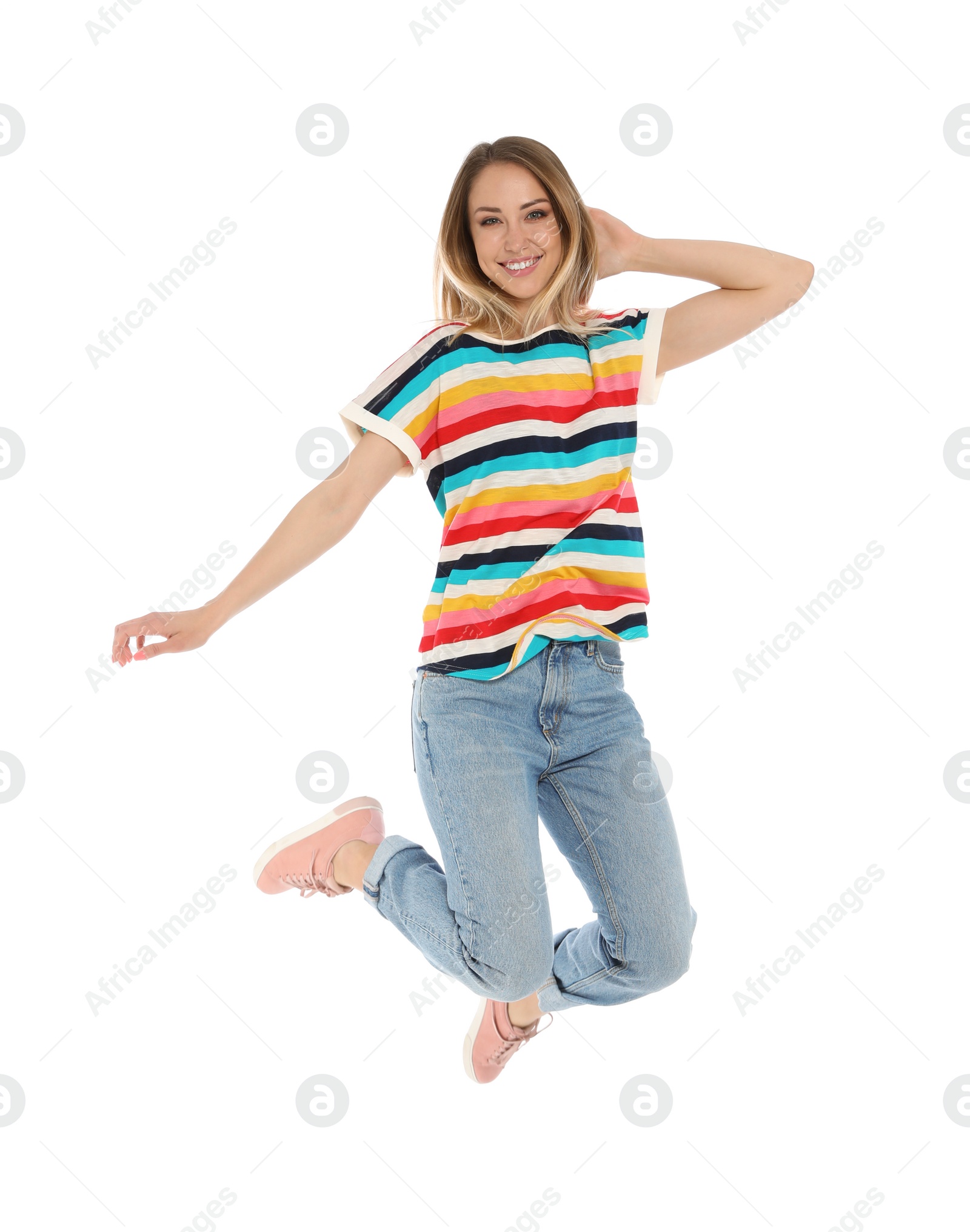 Photo of Portrait of happy jumping woman on white background