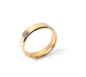 Photo of Shiny gold wedding ring on white background