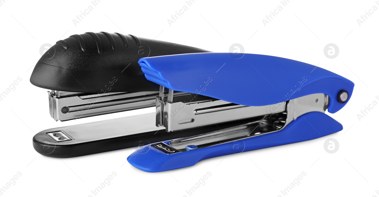 Photo of New bright color staplers isolated on white