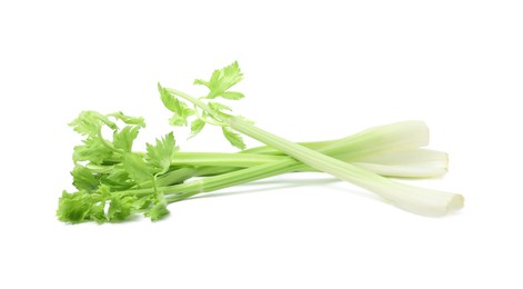 Photo of Fresh green celery stems isolated on white