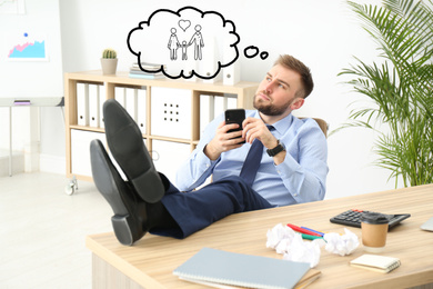 Image of Businessman dreaming about family in office. Concept of balance between life and work