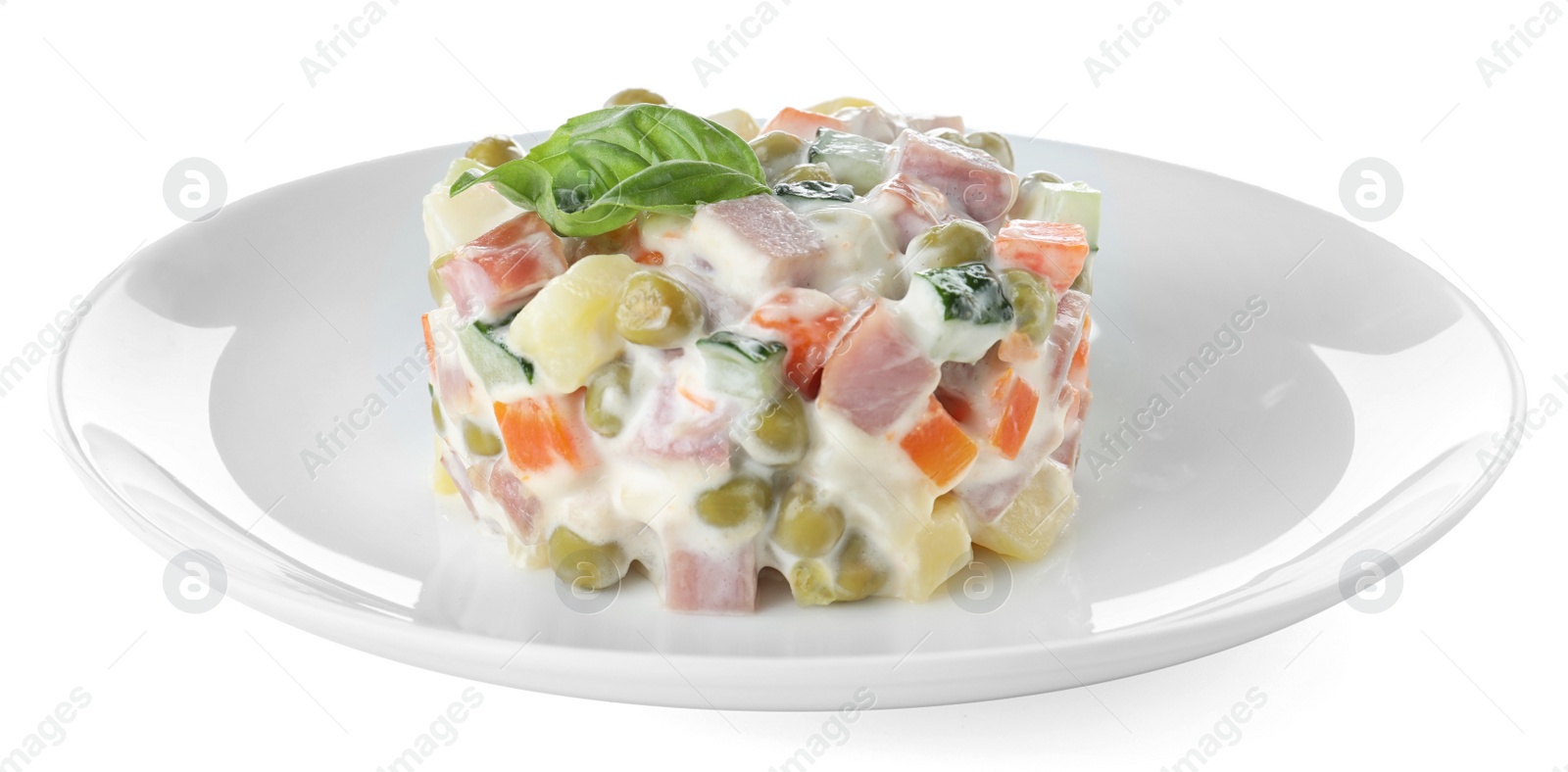 Photo of Delicious homemade salad Olivier on white background